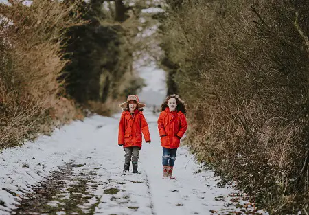 kids walking in snow